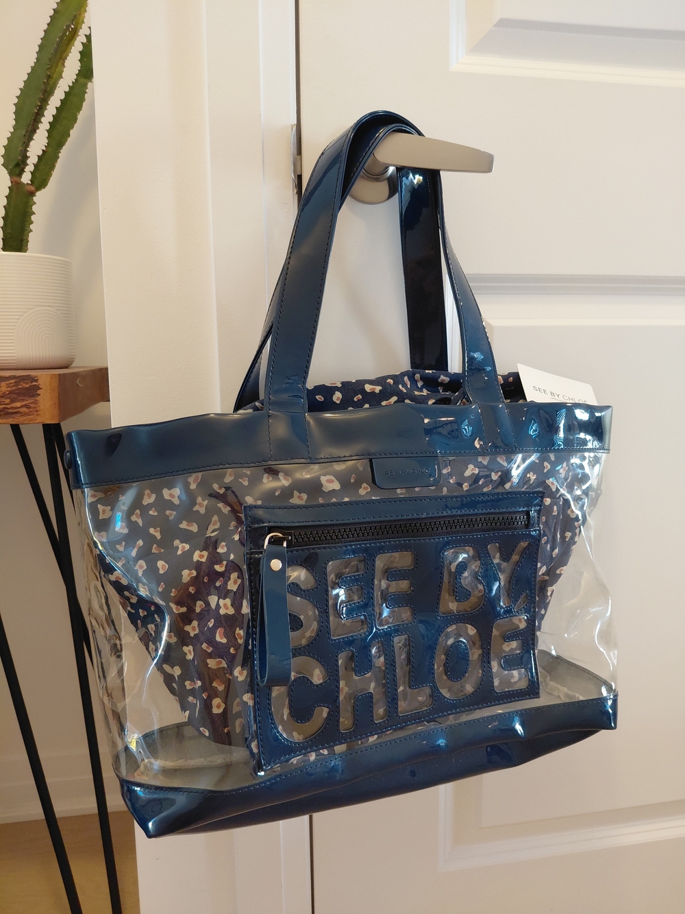 See By Chloe navy blue clear tote with floral pouch